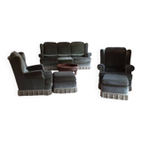 Living room set consisting of 1 three-seater sofa, 2 armchairs, and 2 footrests.