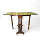 “Gateleg” folding walnut table