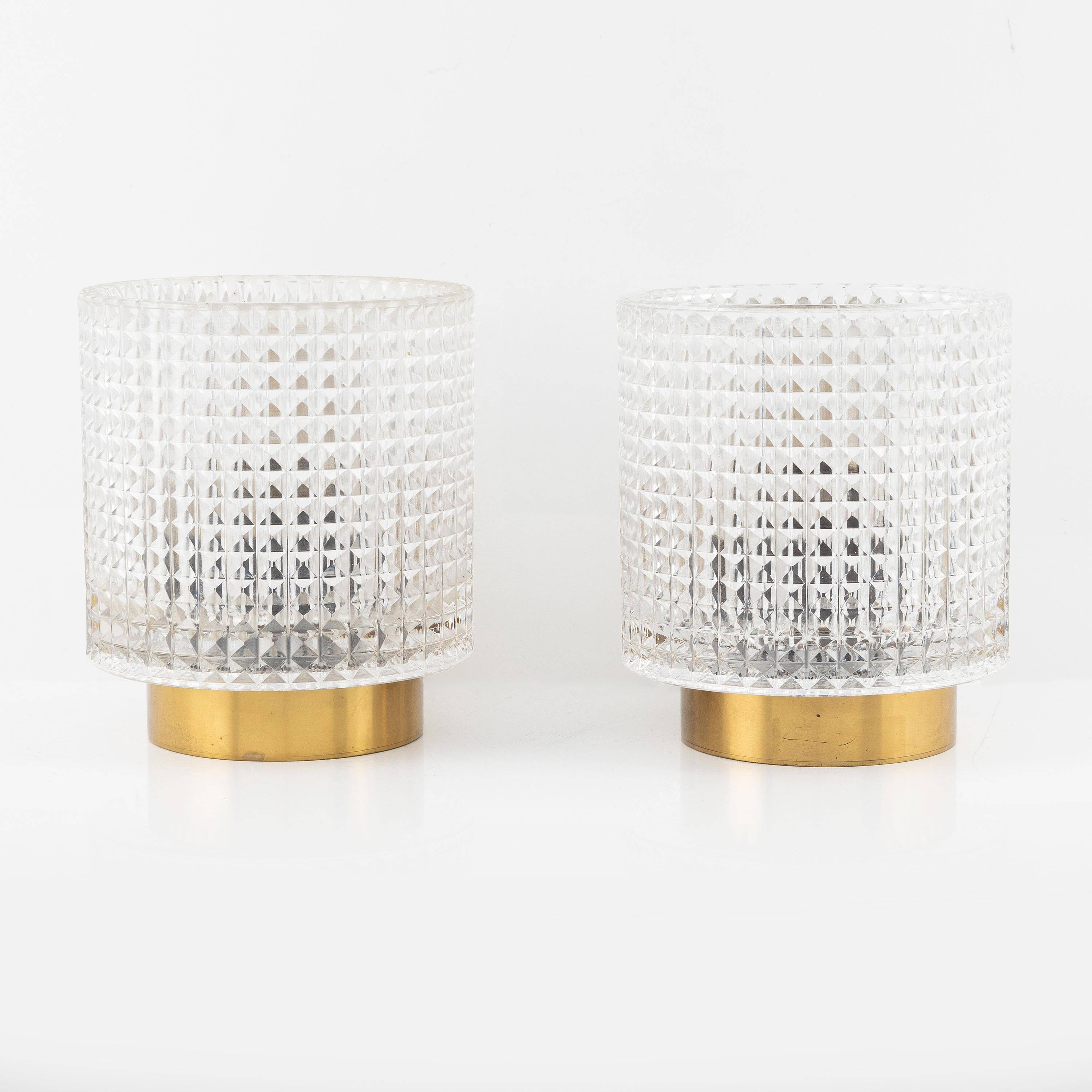Carl Fagerlund for Orrefors Pair of wall lights in brass and glass Sweden 1960