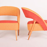 Mid century red and orange chairs. made in 1940