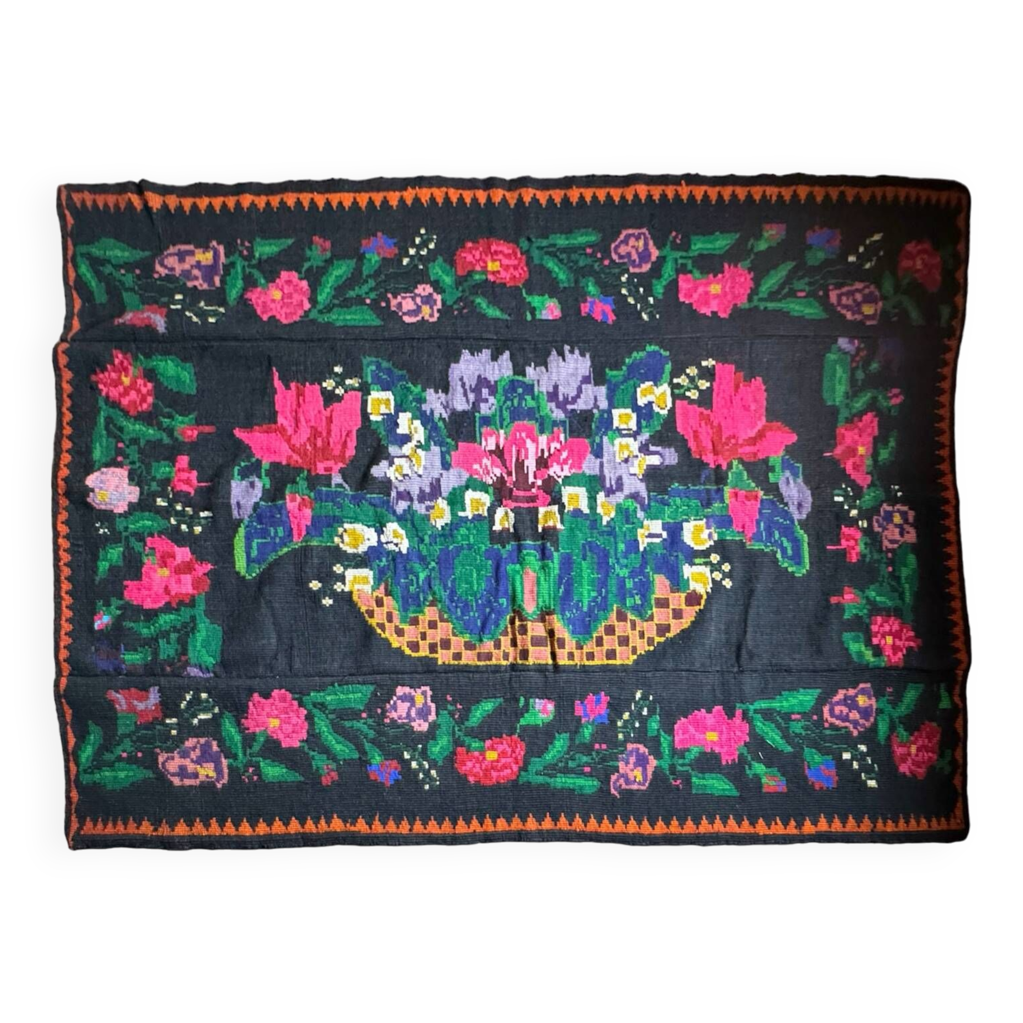 Romanian black wool carpet with a basket of colorful flowers
