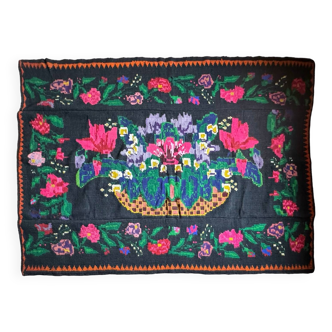 Romanian black wool carpet with a basket of colorful flowers