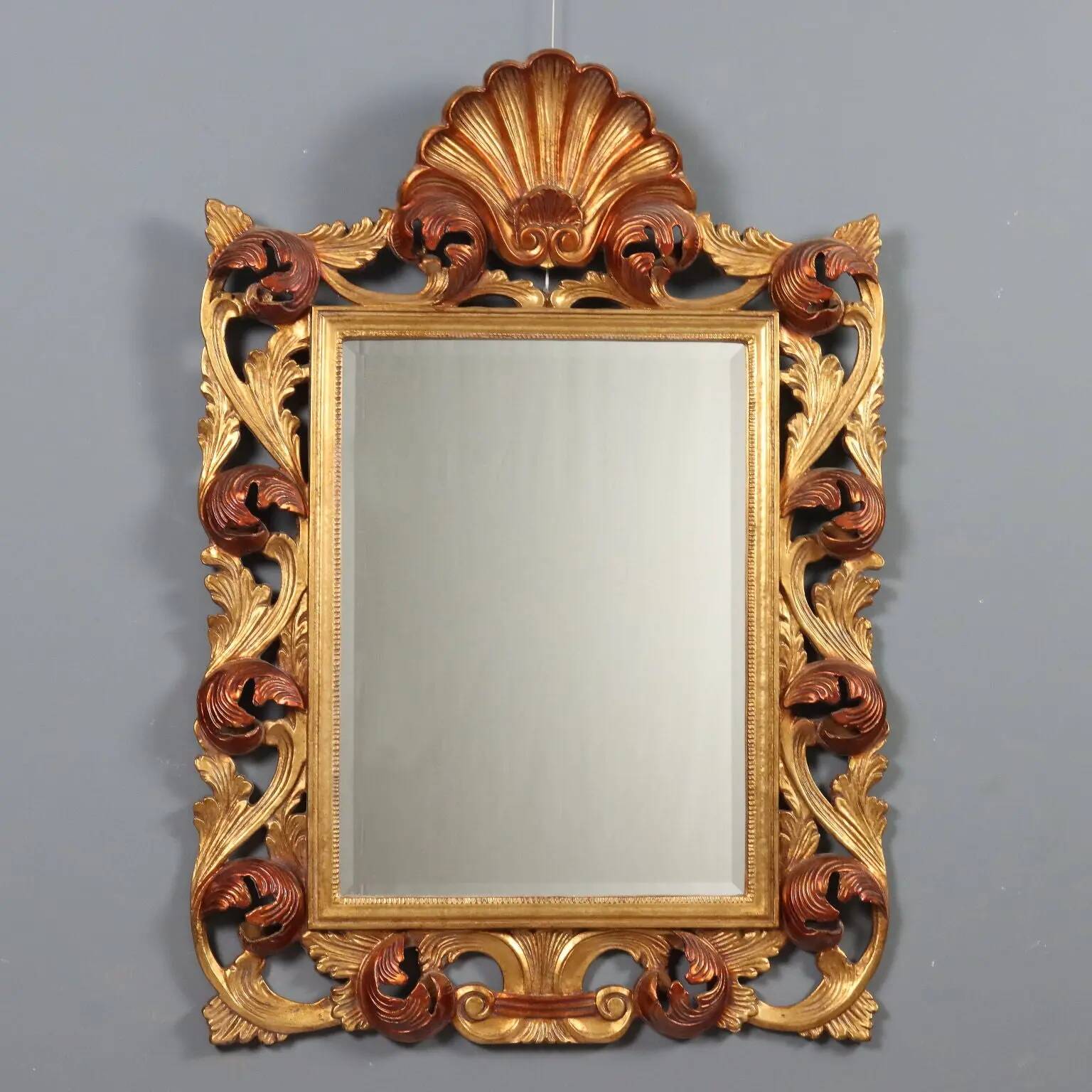 Antique baroque style mirror in carved wood, Italy, 20th century.