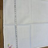 Cotton napkin edged by hand with flowers, France