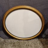 Golden oval frame