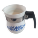 white ceramic milk jug with blue flowers, metal handle