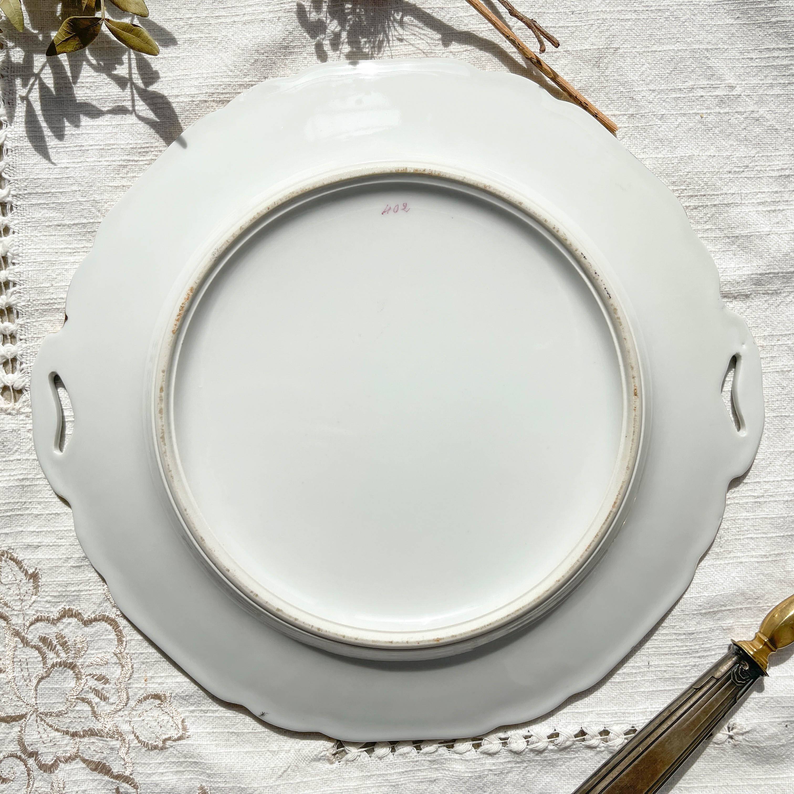 Vintage Limoges Berry porcelain cake dish with bird of paradise motif -