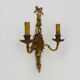 Vintage wall lamp decorated with ribbon and grape. Louis XVI style. XIXth