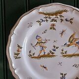 Moustiers scalloped plate in very good condition.