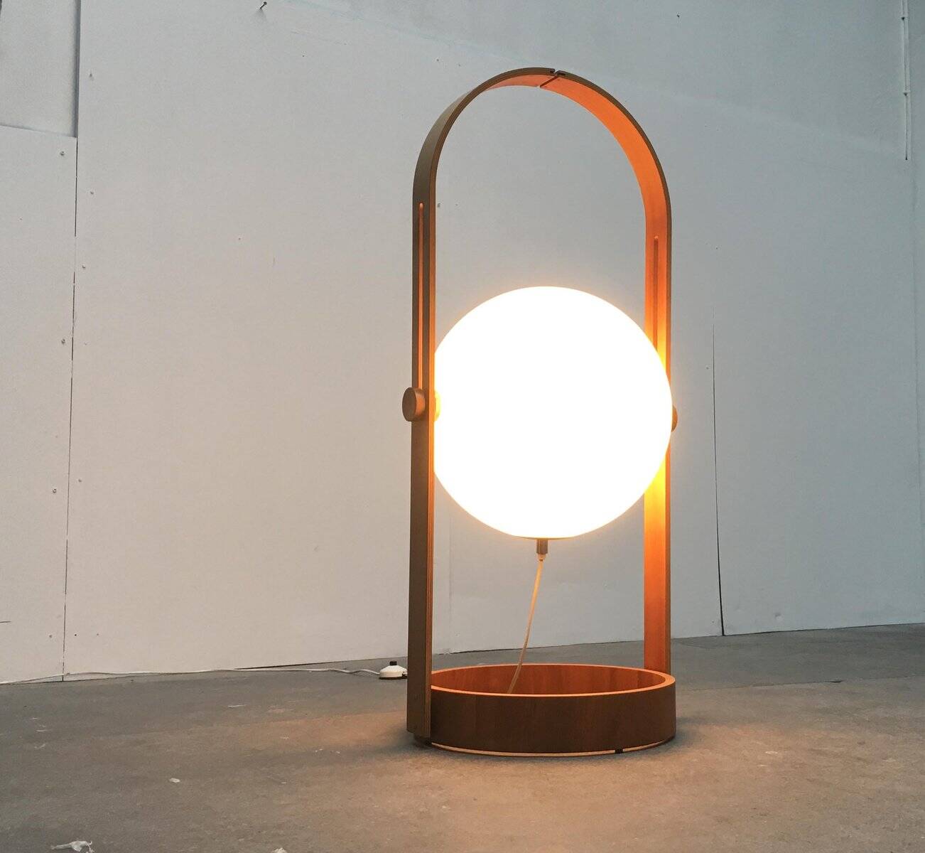 Swiss space-style floor lamp made of plastic and plywood from the 1960s.