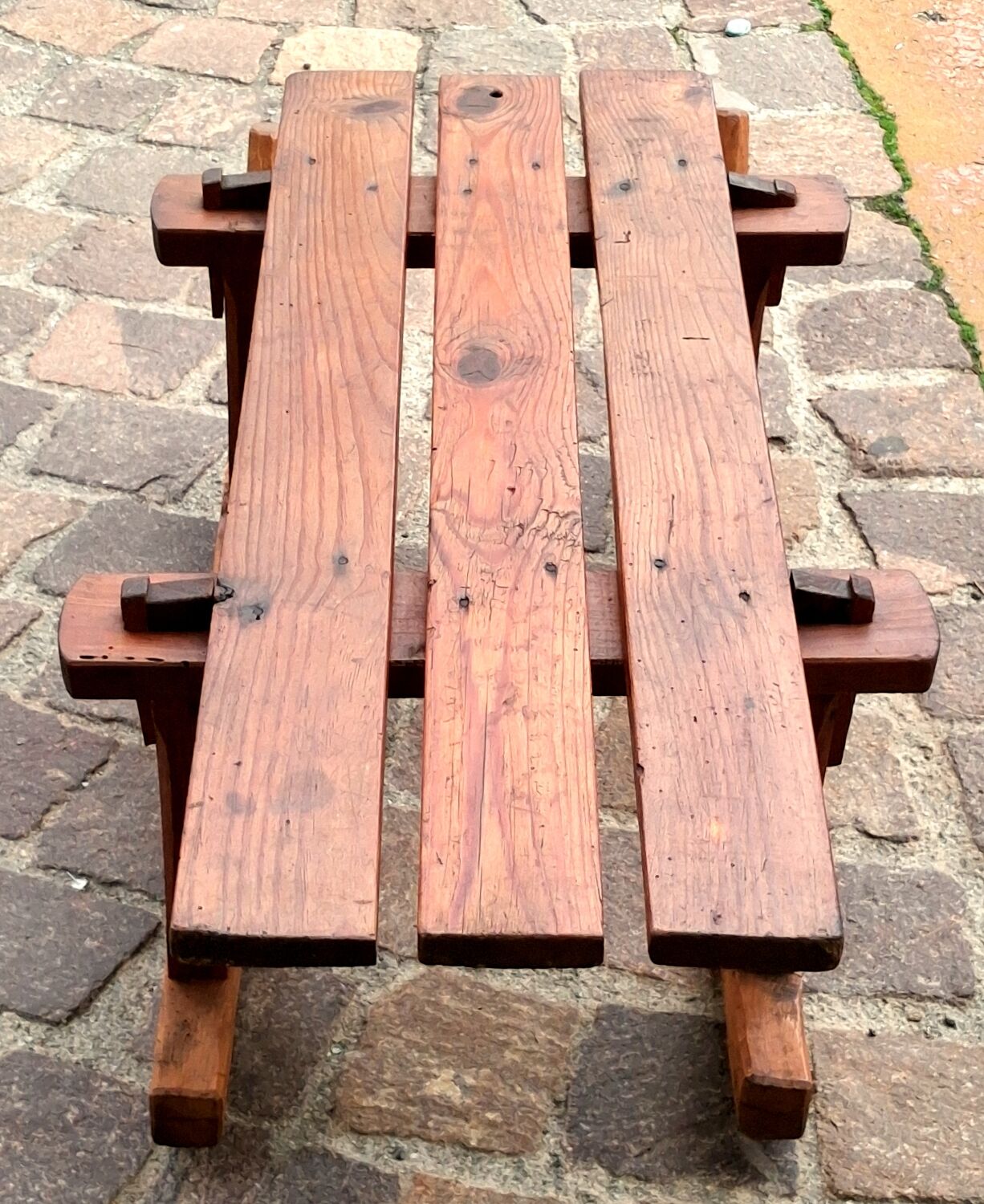 Rustic bench, old folk art, snow sled, Alps.
