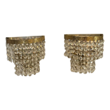 Pair of brass sconces and tassels