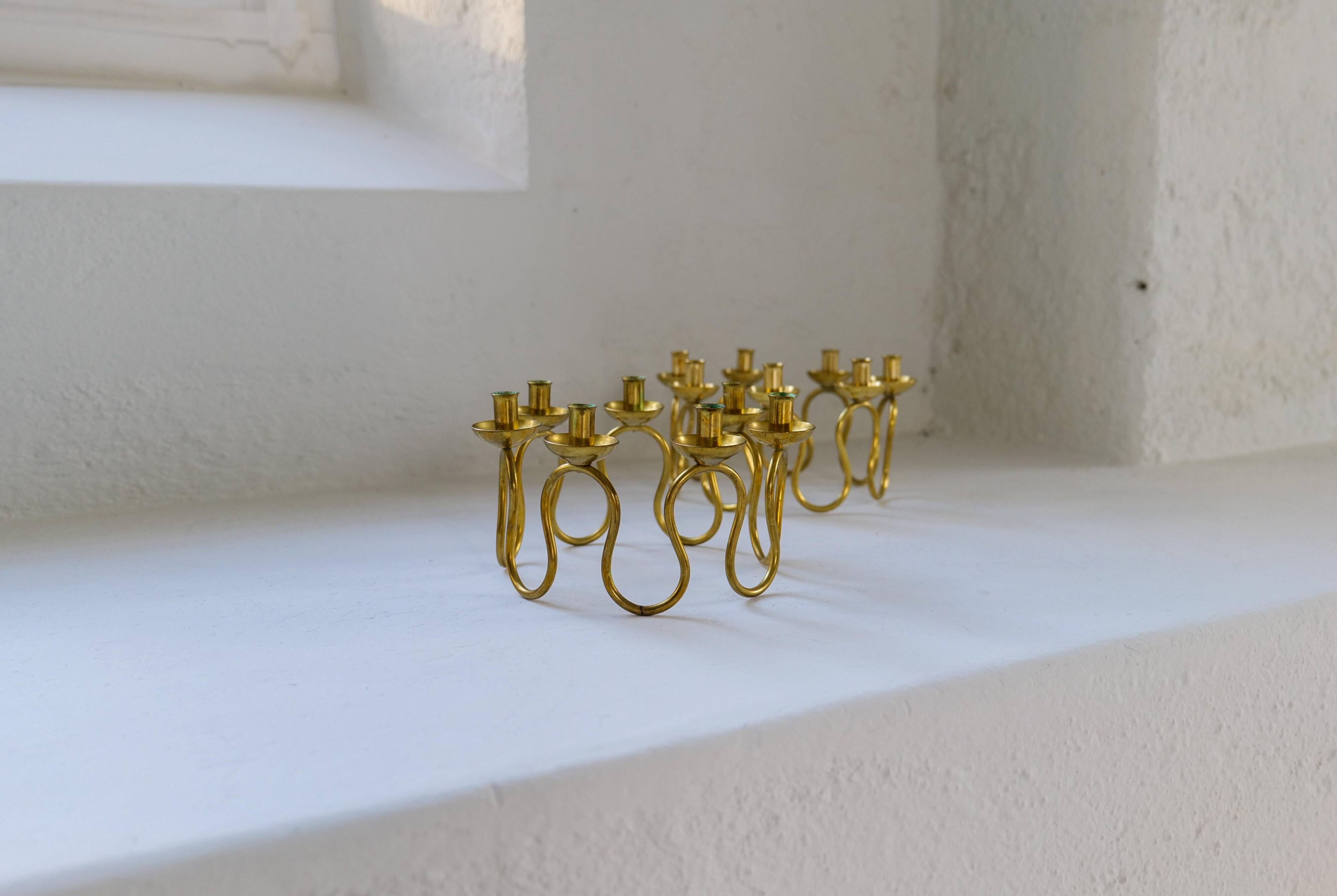 Art Deco brass chandeliers by Lars Holmström in Arvika, Sweden.