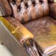 Brown vintage handmade chesterfield recliner armchair