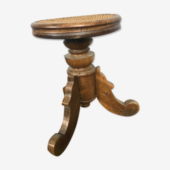 Tabouret de piano en noyer et cannage