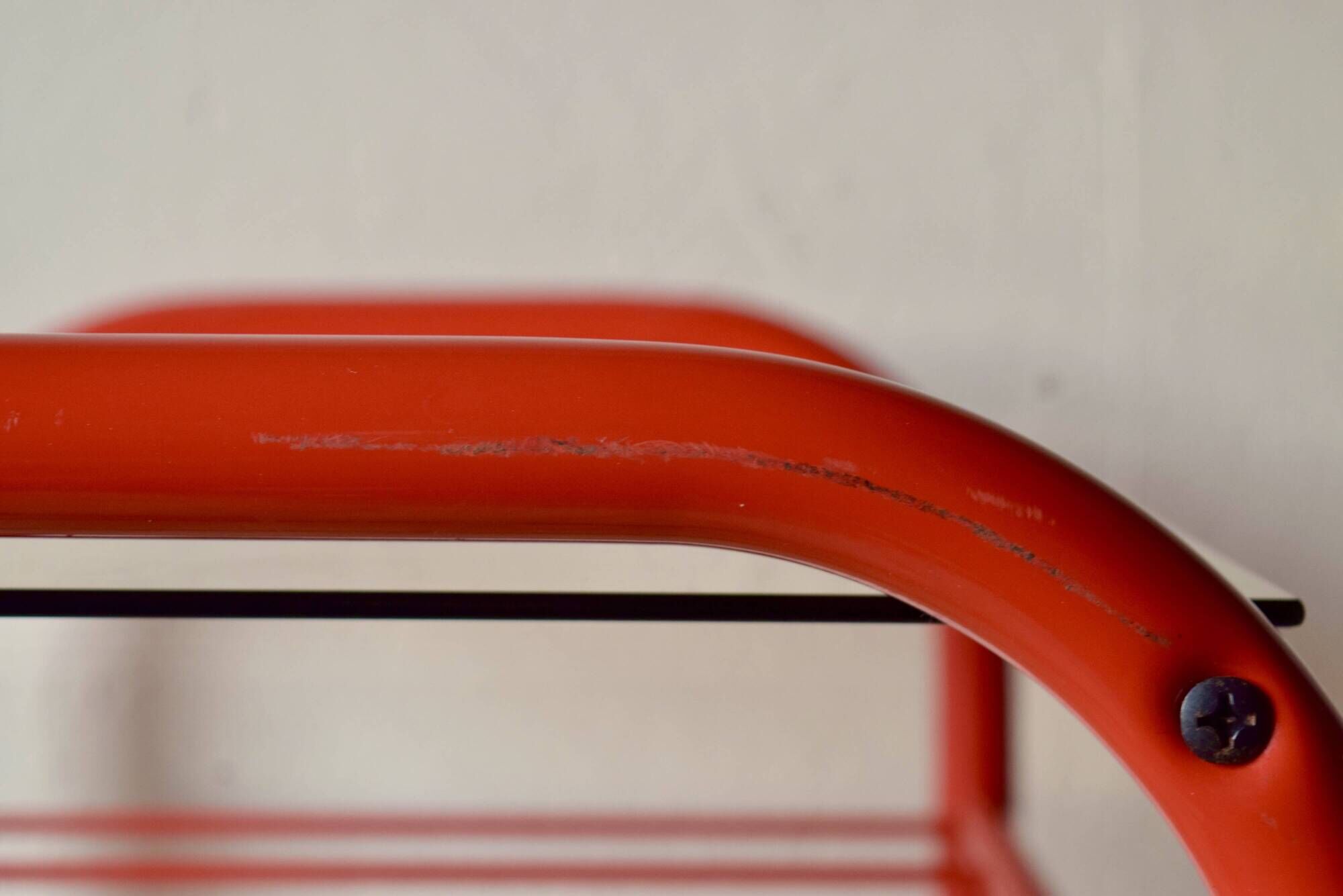 Vintage side table in red tubular steel - smoked glass window - 1980s