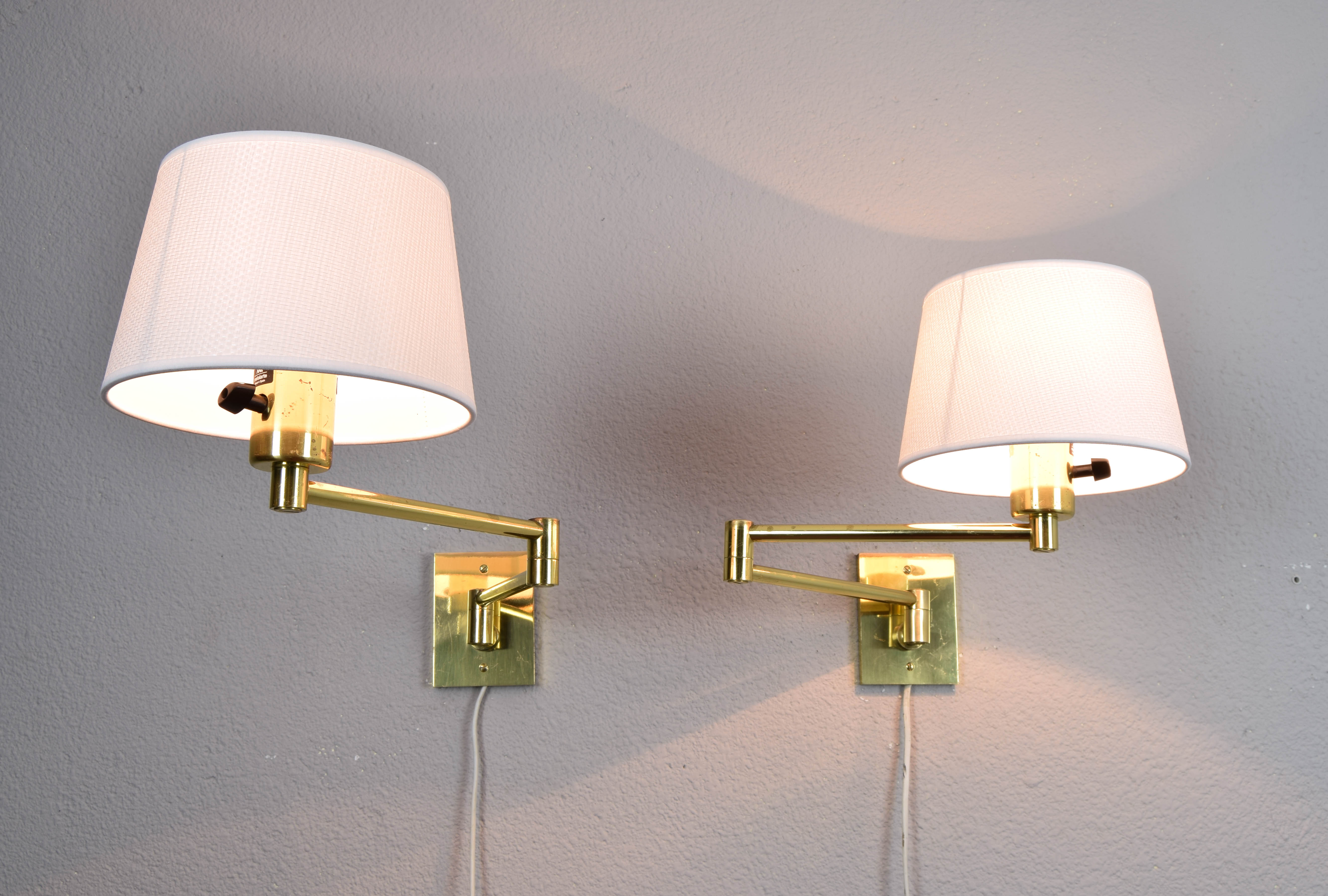 Two Mid-Century Modern Swing Arm Brass Sconces by George W Hansen for Metalarte
