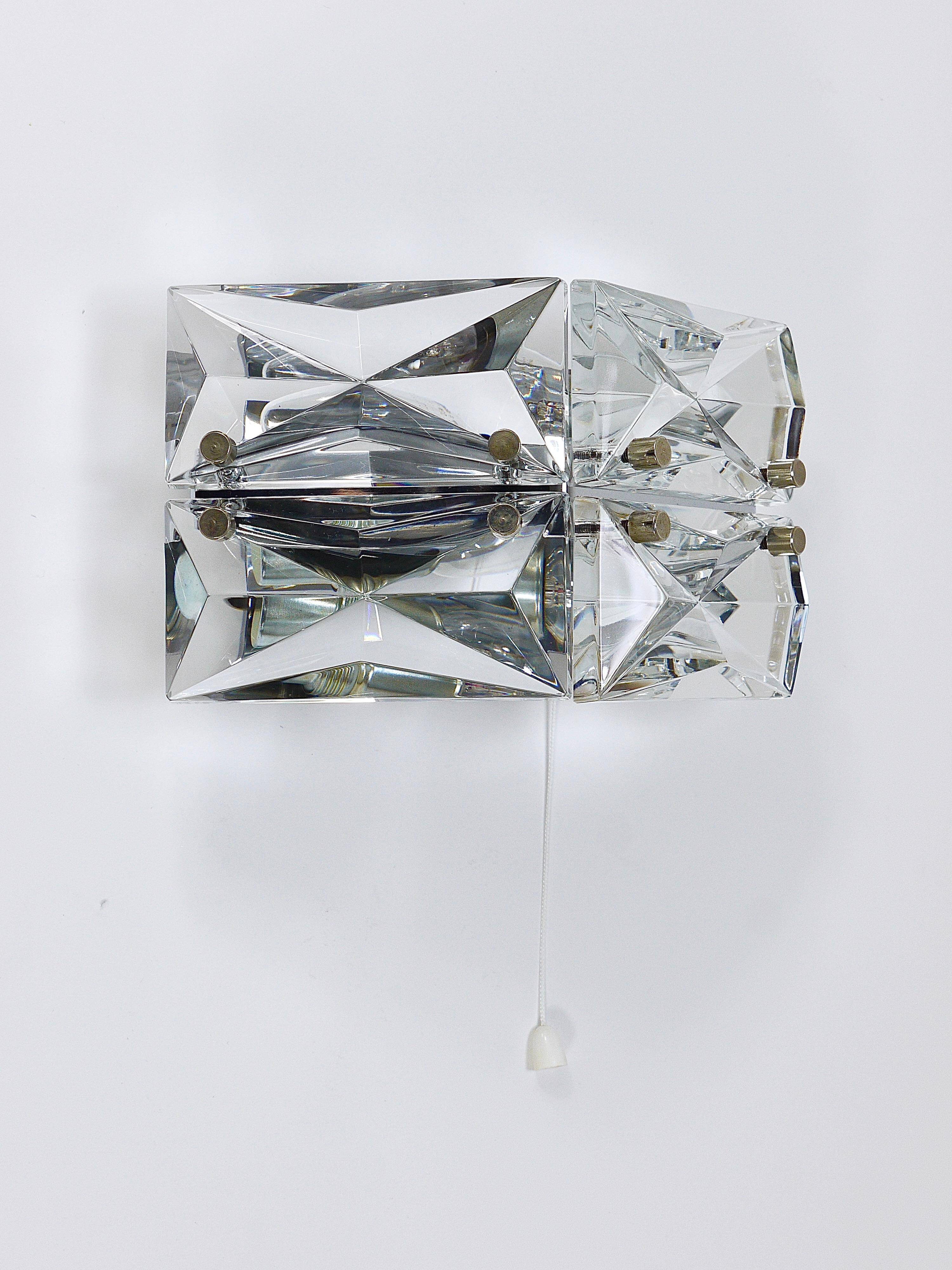 Pair of wall sconces in faceted crystal and chrome / prism glass wall lamps by Kinkeldey