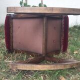 50s footrest in red velvet and scuplented wood