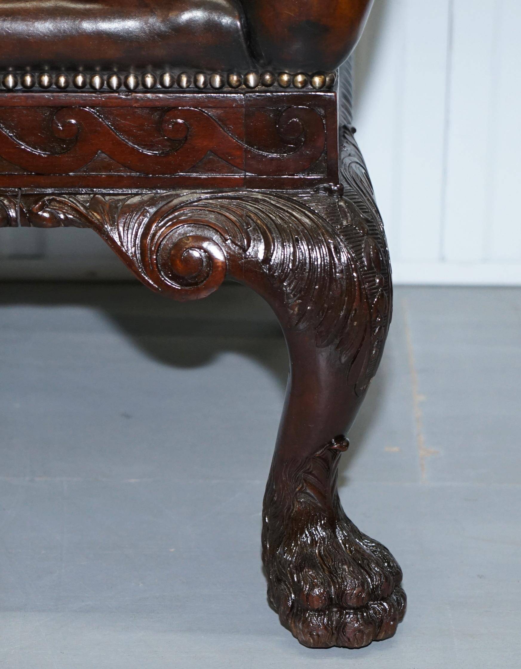 Chesterfield leather canapé in Georgian style with lion paw carved feet.