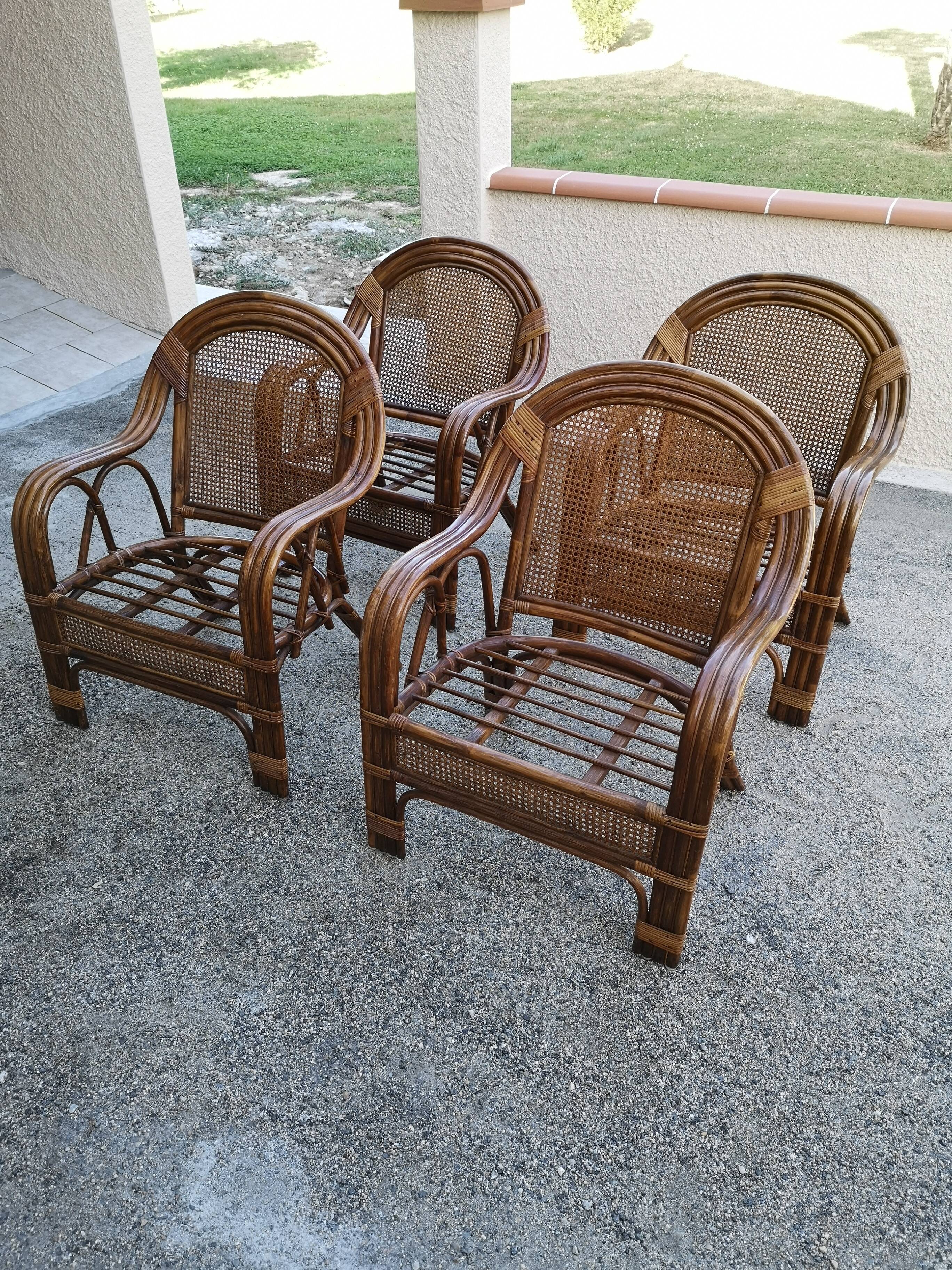 4 vintage rattan armchairs