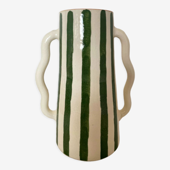 Handmade green and white striped ceramic vase with abstract corrugated handheld