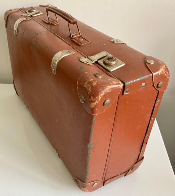 Small old brown suitcase