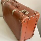 Small old brown suitcase