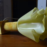 Lamp draped on column