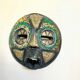 Vintage mask in carved wood beads and copper metal