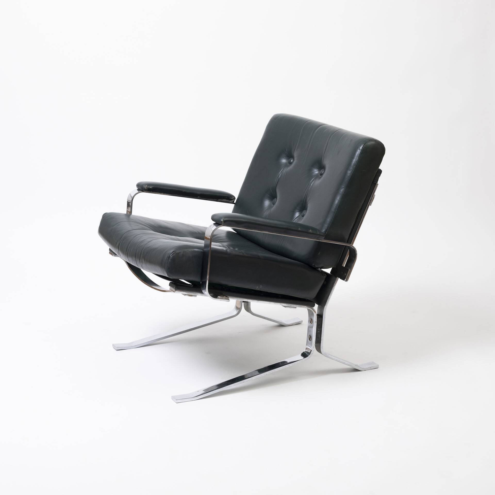 Green leather and chrome lounge chair, 1970s