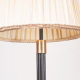 Black floor lamp on tripod base