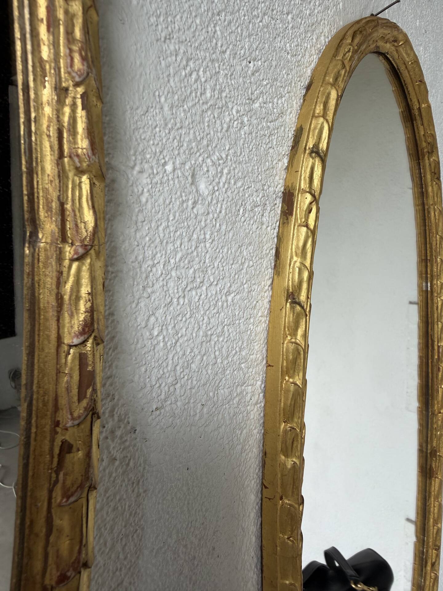 Pair of oval mirrors 1900 gilded stucco