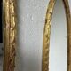 Pair of oval mirrors 1900 gilded stucco