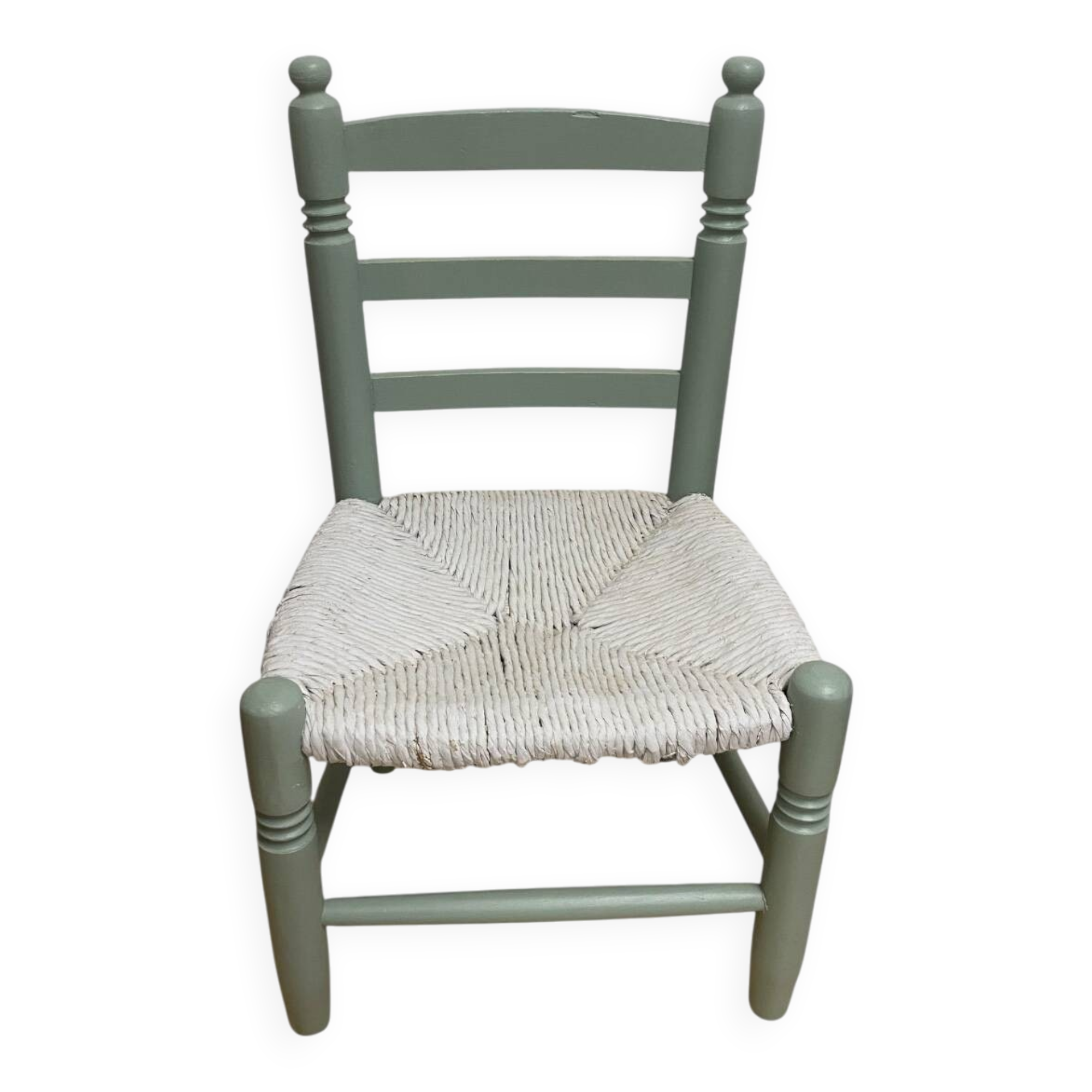 Child's chair in wood and straw revamped in almond green and white.