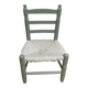 Child's chair in wood and straw revamped in almond green and white.