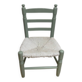 Child's chair in wood and straw revamped in almond green and white.