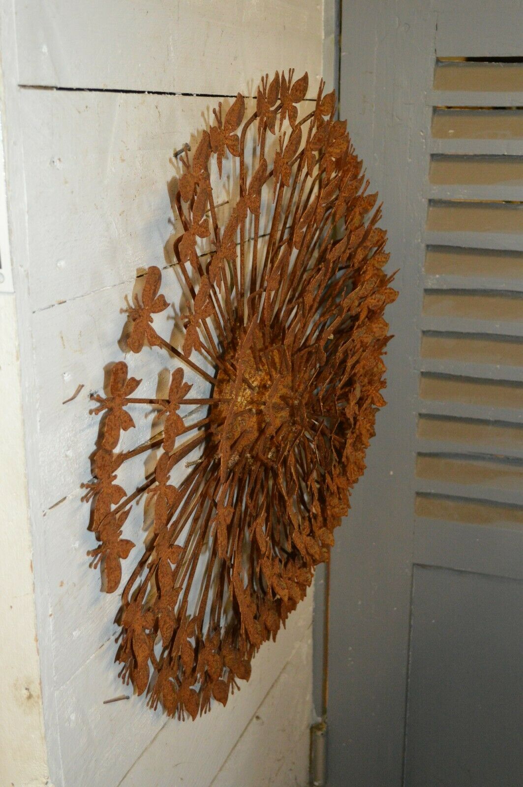 Wrought iron flower with butterflies