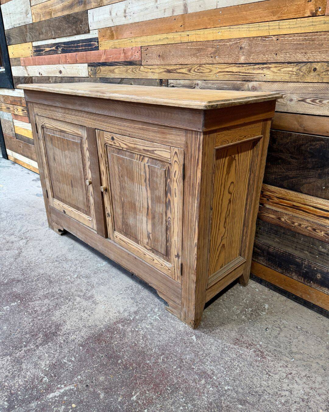 Old low sideboard in solid pitch pine