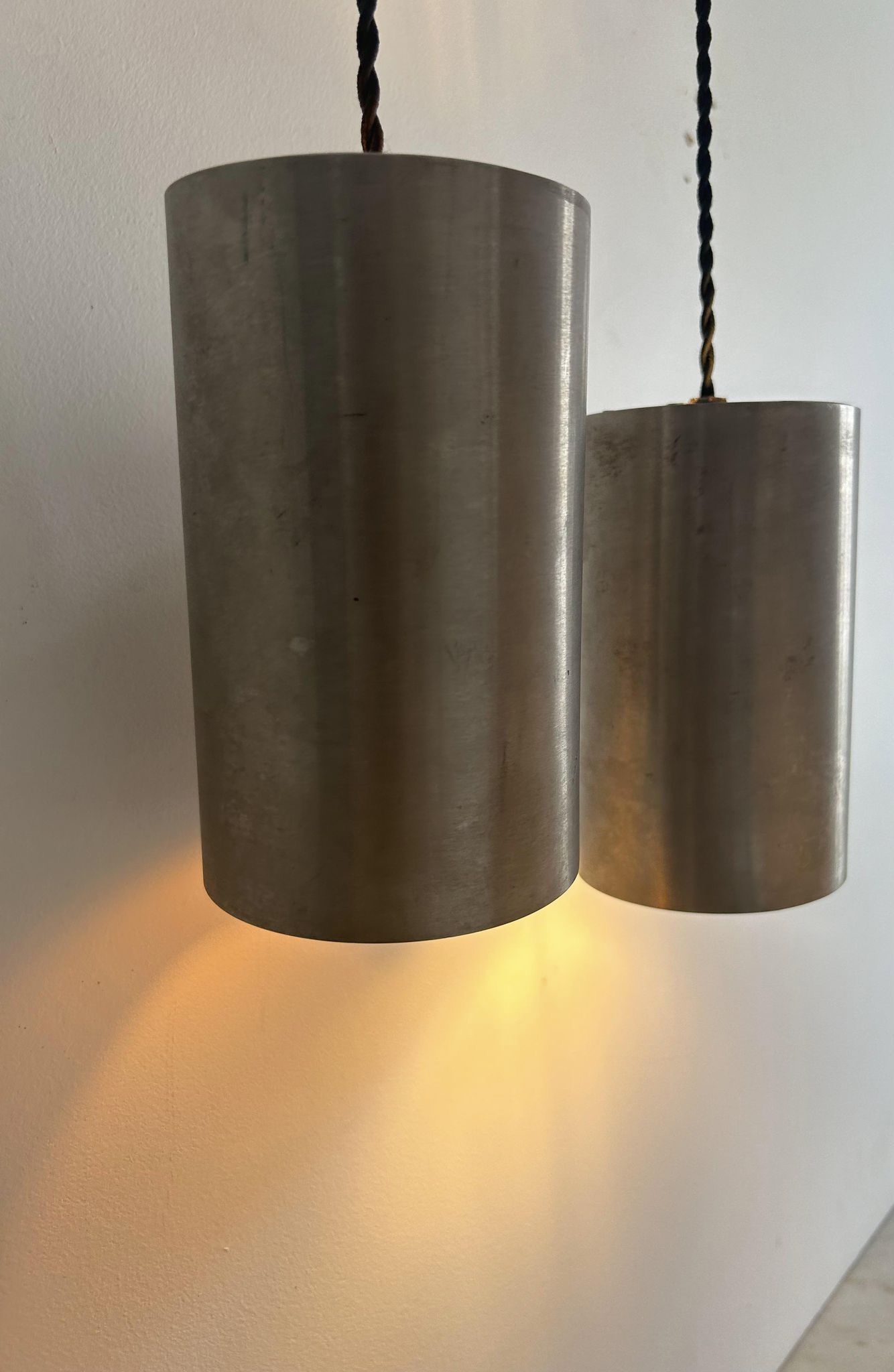 Pair of vintage brushed metal pendant lamps, France 1960