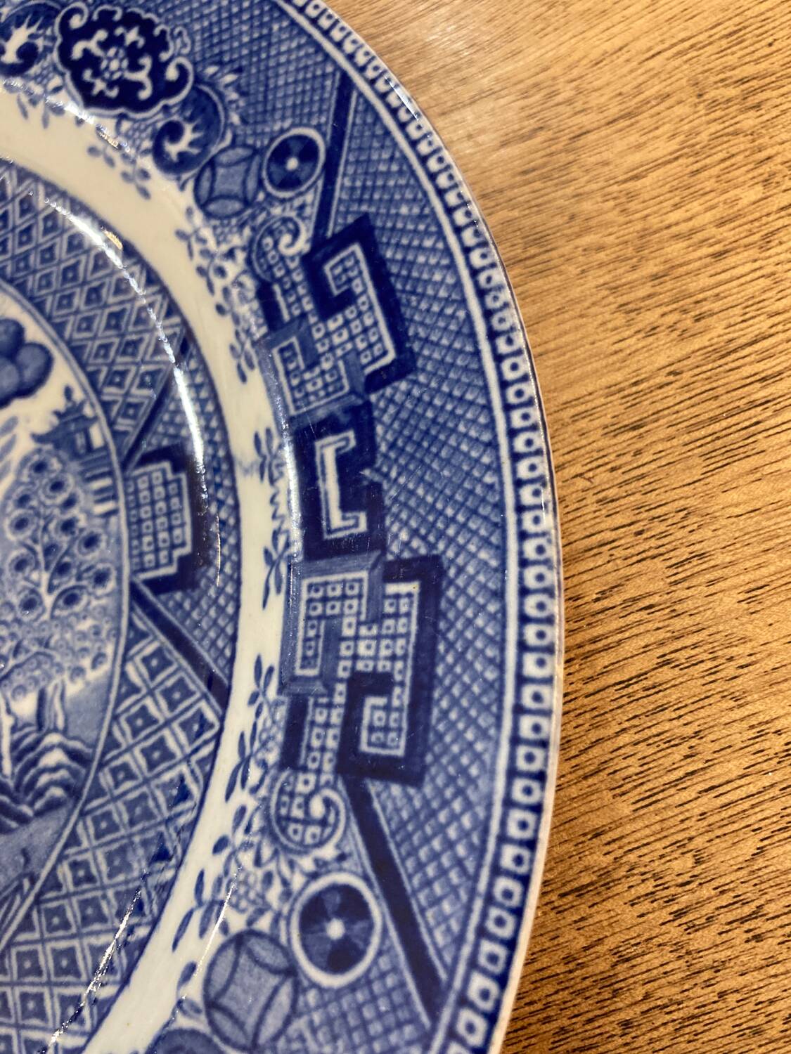 Assiette blue willow XIXeme décor chinois