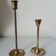Set of two straight brass candlesticks.