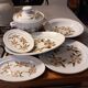 Saint Amand earthenware dishes and tureen set