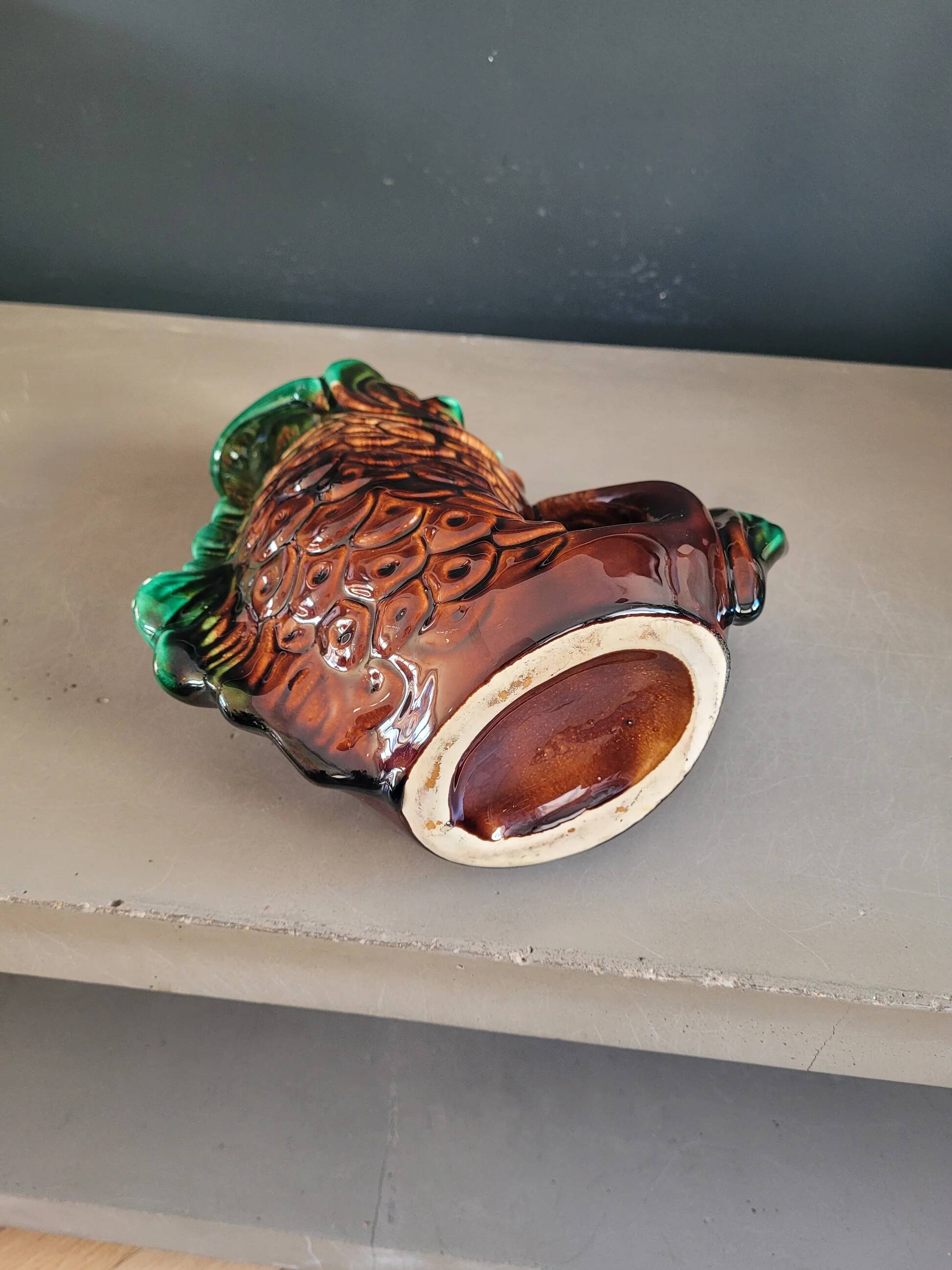 Old ceramic fish jug