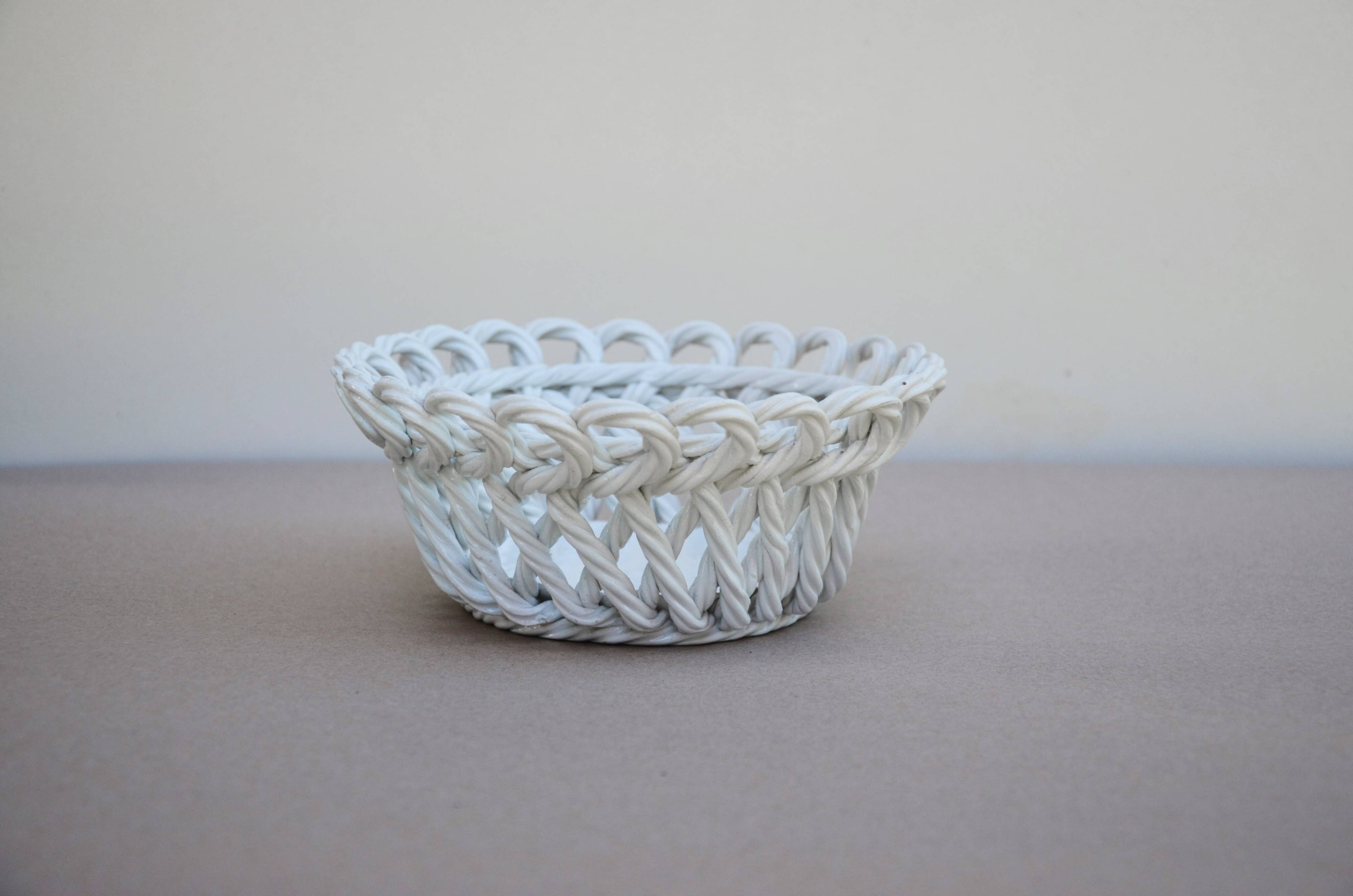 Woven ceramic basket