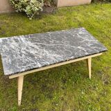 Coffee table with compass legs