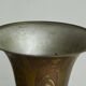 Art Deco fluted vase in patinated metal and brass from the 1930s.