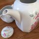 Vintage porcelain coffee or teapot with milk jug