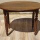 Antique walnut console table with honey spoon legs.