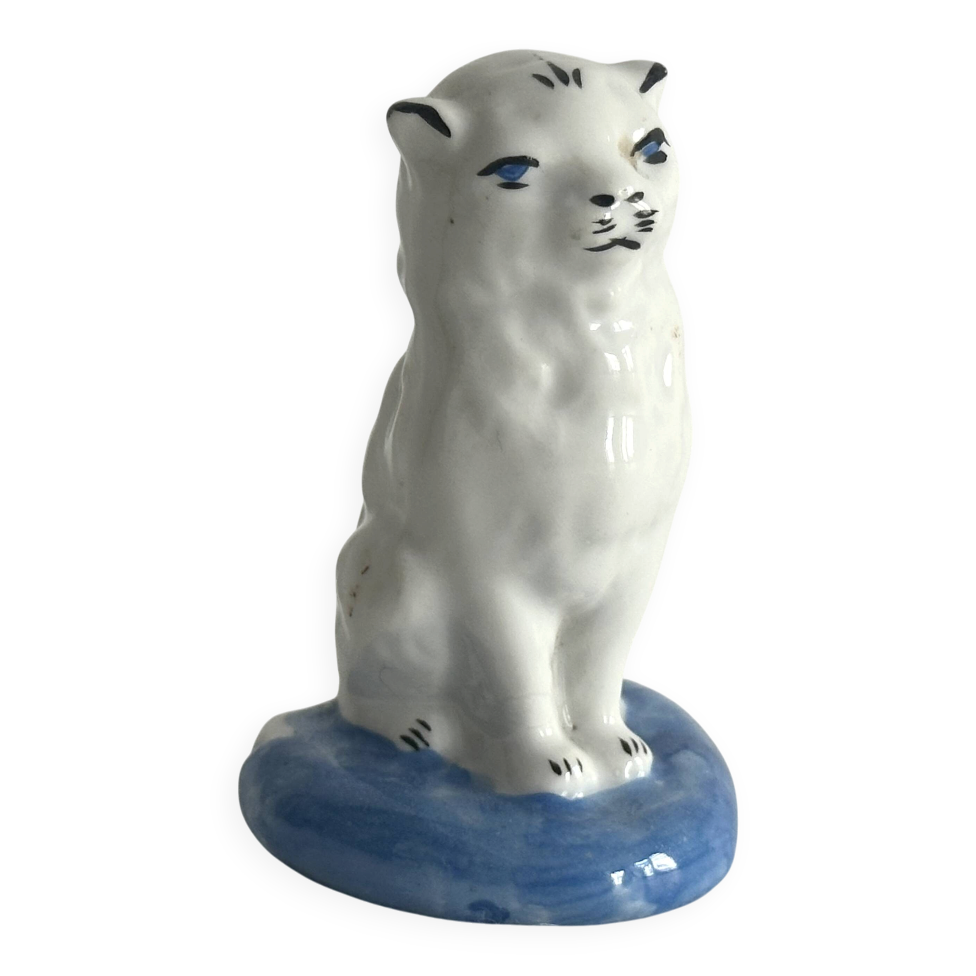Small ancient glazed ceramic cat from the 19th century.